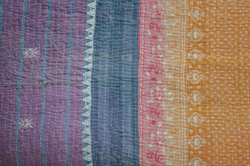 Close up of a fabric bedspread or throw